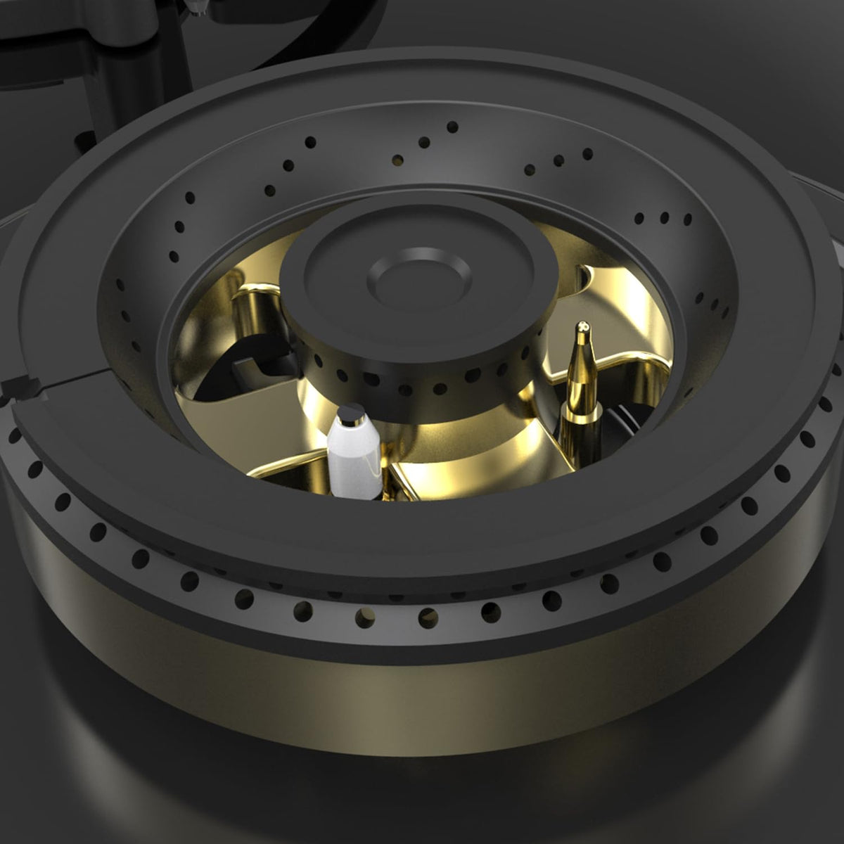 Close-up of a full brass burner on the Kaff Ashford ASF 783 with ignition electrode and flame sensor