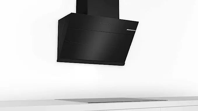 Bosch DWKA98G6OI chimney mounted on a white wall above a hob