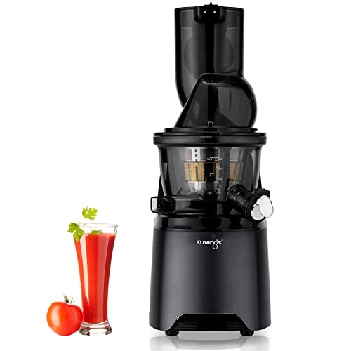 Kuvings EVO810 Black cold press juicer with a glass of tomato juice and a tomato