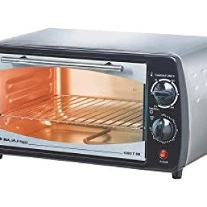 Bajaj bajaj-otg-10ltr-bs 1000 TSS 10 L oven toaster griller front view with lit chamber, wire rack and control knobs