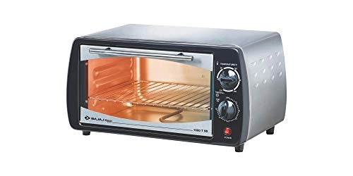 Bajaj bajaj-otg-10ltr-bs 10 L OTG angled view showing glass door, steel body and temperature and timer knobs