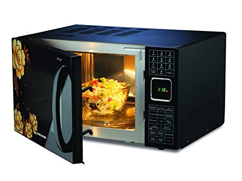 Morphy Richards 27CGF microwave oven with door open and a glass bowl of rice dish inside