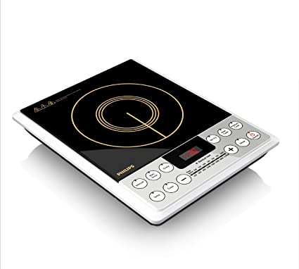 Philips HD4929/01 induction cooktop angled view showing the glass cooking surface with gold coil design