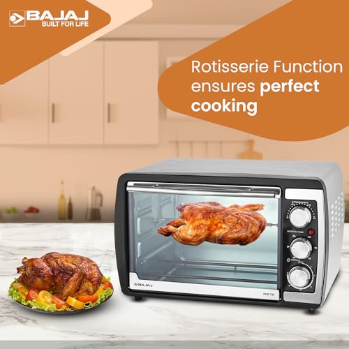 Bajaj 2000 TM OTG with rotisserie chicken in the cavity and rotisserie function highlighted