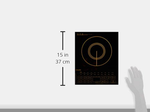 Philips HD4938/01 induction cooktop top view with 37 cm (15 in) height scale beside a hand