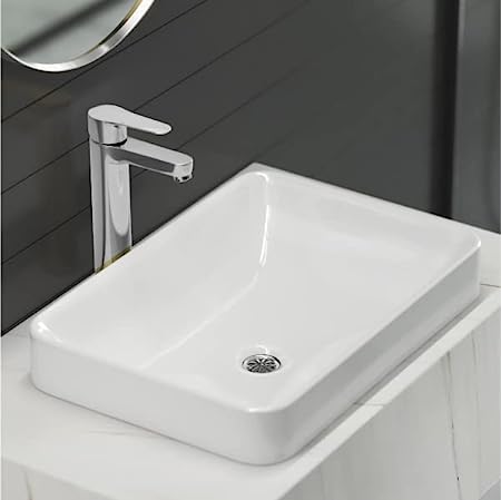 kohler K-45432IN-CP Grid drain with overflow hole in polished chrome