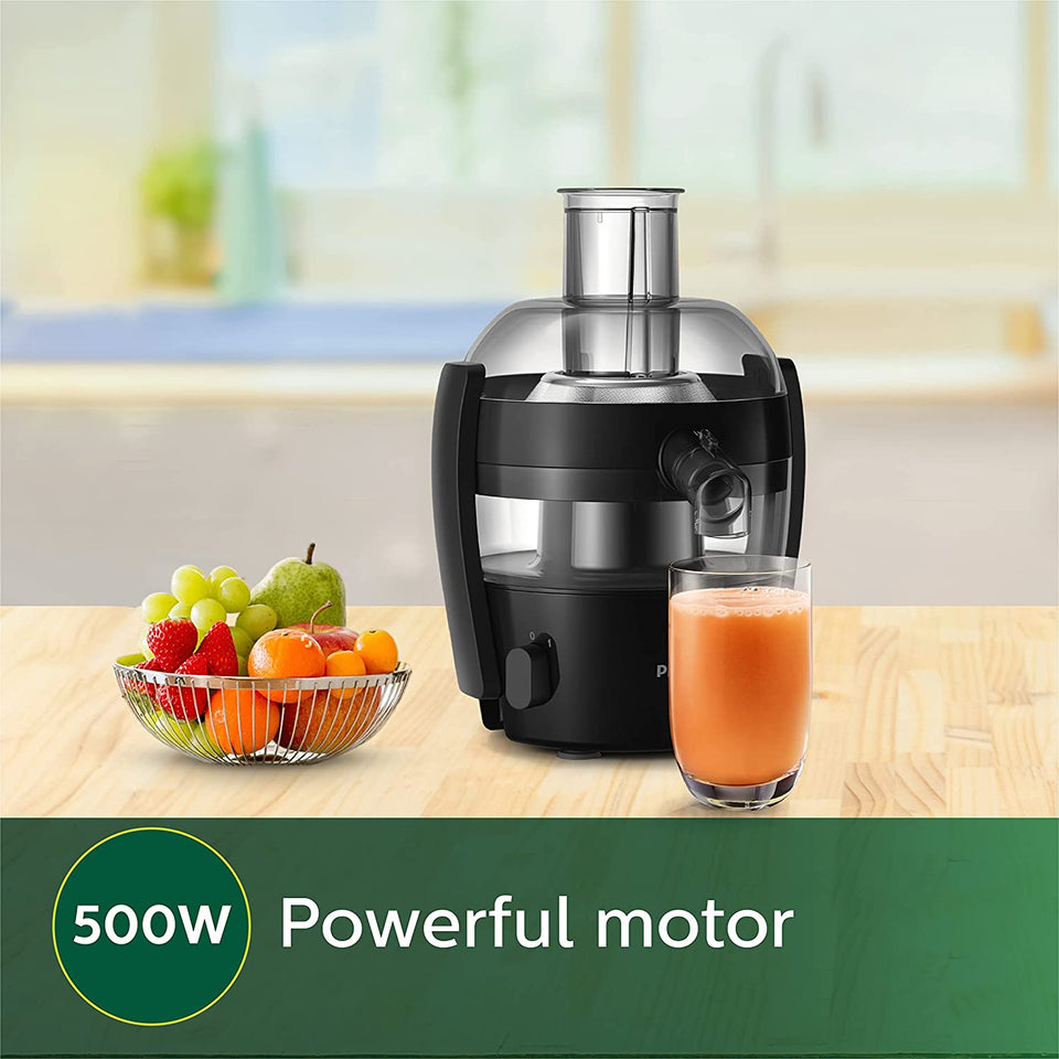 Philips HR1832/00 juicer on a kitchen counter beside a fruit basket with a 500W powerful motor label