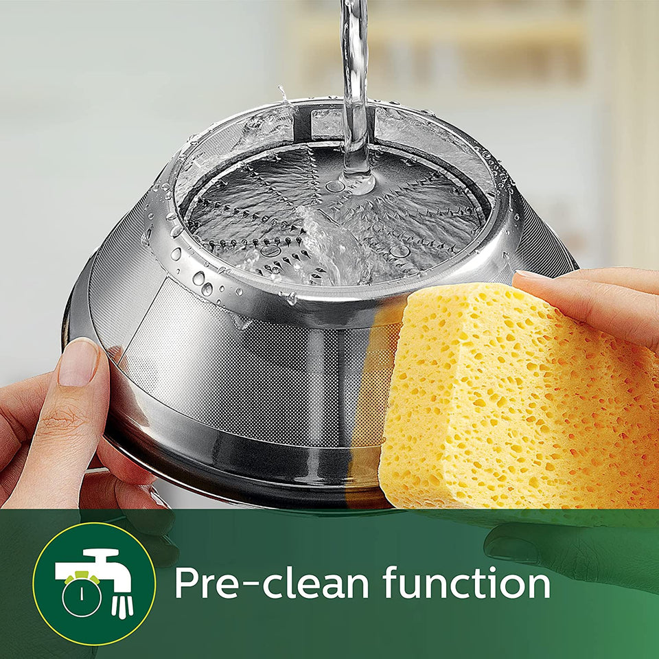 Stainless steel QuickClean sieve of the Philips HR1832/00 juicer being rinsed under water with a sponge