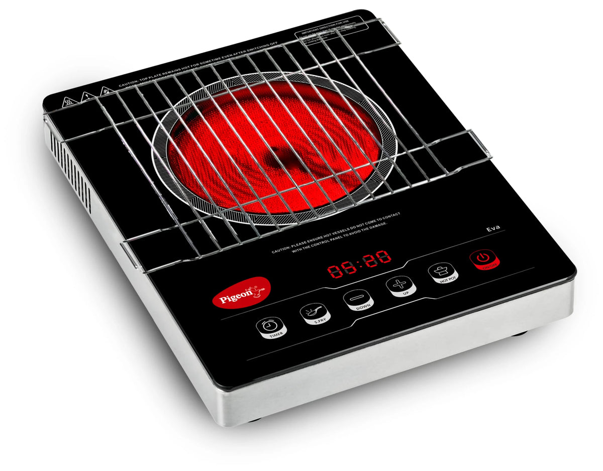 Pigeon Eva infrared cooktop in black with the free stainless steel grill placed over the glowing red burner