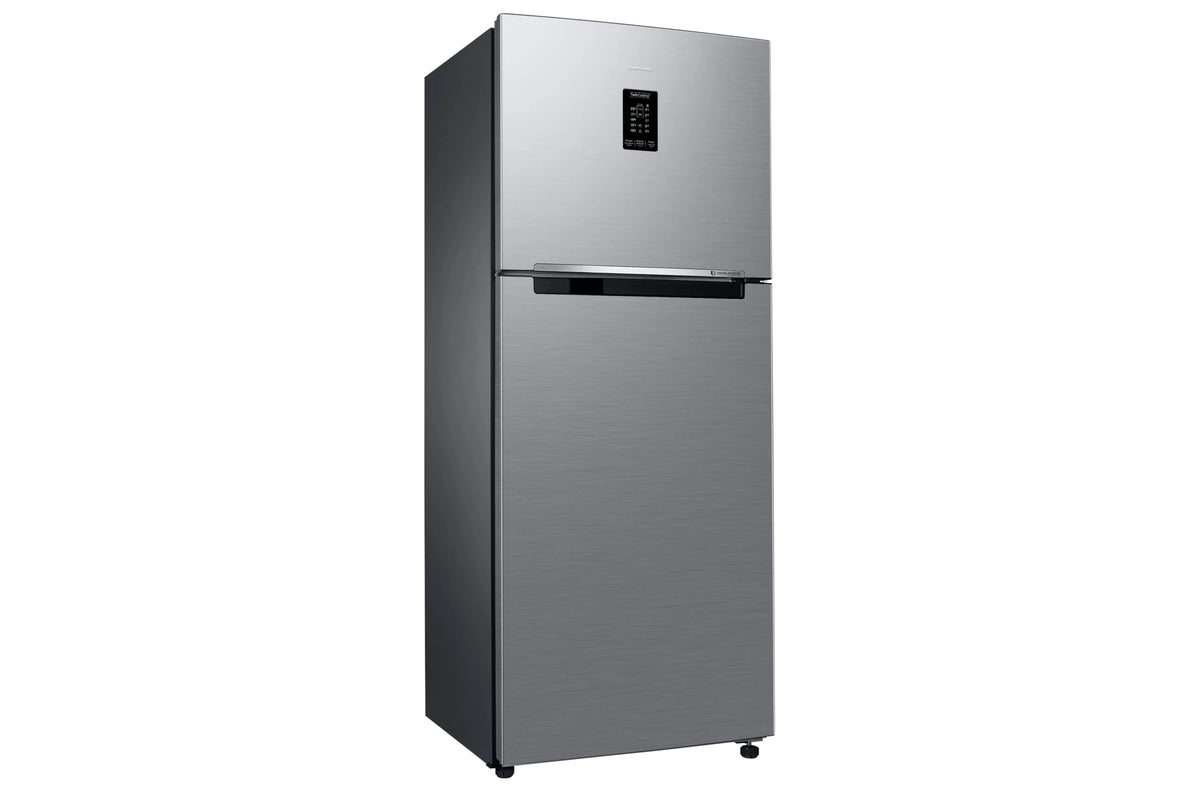 Left-angled view of Samsung RT31H4522S8/HL refrigerator showing silver doors and dark side panel