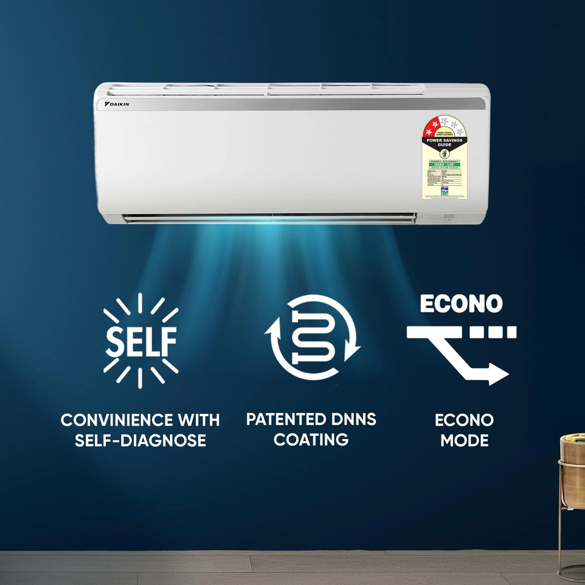 Daikin FTQ28XV16 split AC on a blue wall with cool airflow, showing self-diagnose, DNNS coating and Econo mode icons