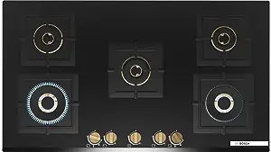 Bosch PNV9B6G20I black glass gas hob with two burners lit, seen from above