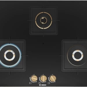 Bosch PND7B6F20I black glass gas hob with three brass burners, one lit with a blue flame, seen from above