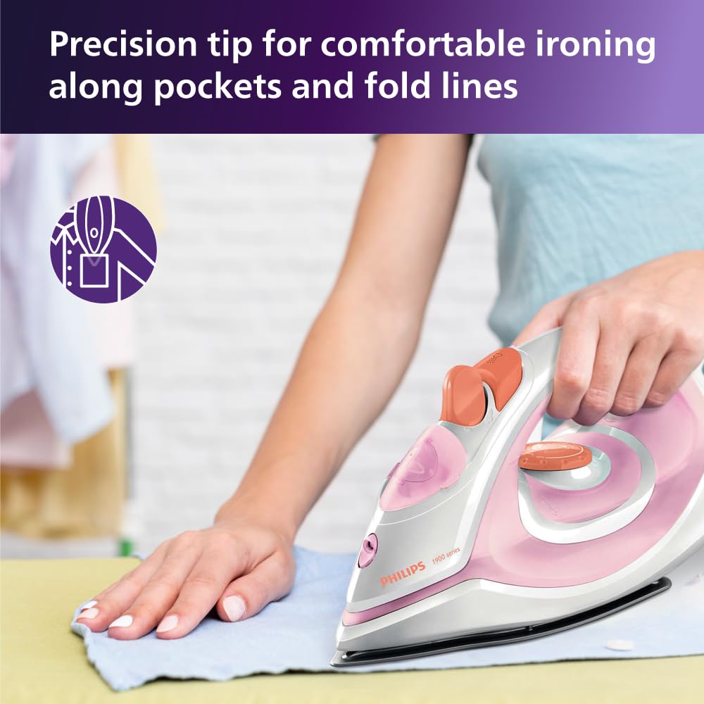 Person ironing a cloth with the Philips GC1920/28 1900 Series steam iron
