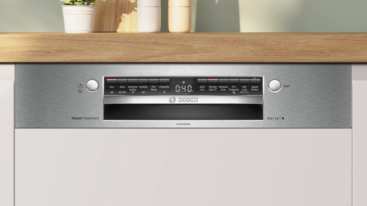 Close-up of Bosch SMI4IKS00I Series 4 control panel showing Eco, Auto, Intensive Kadhai, Express and other programme buttons