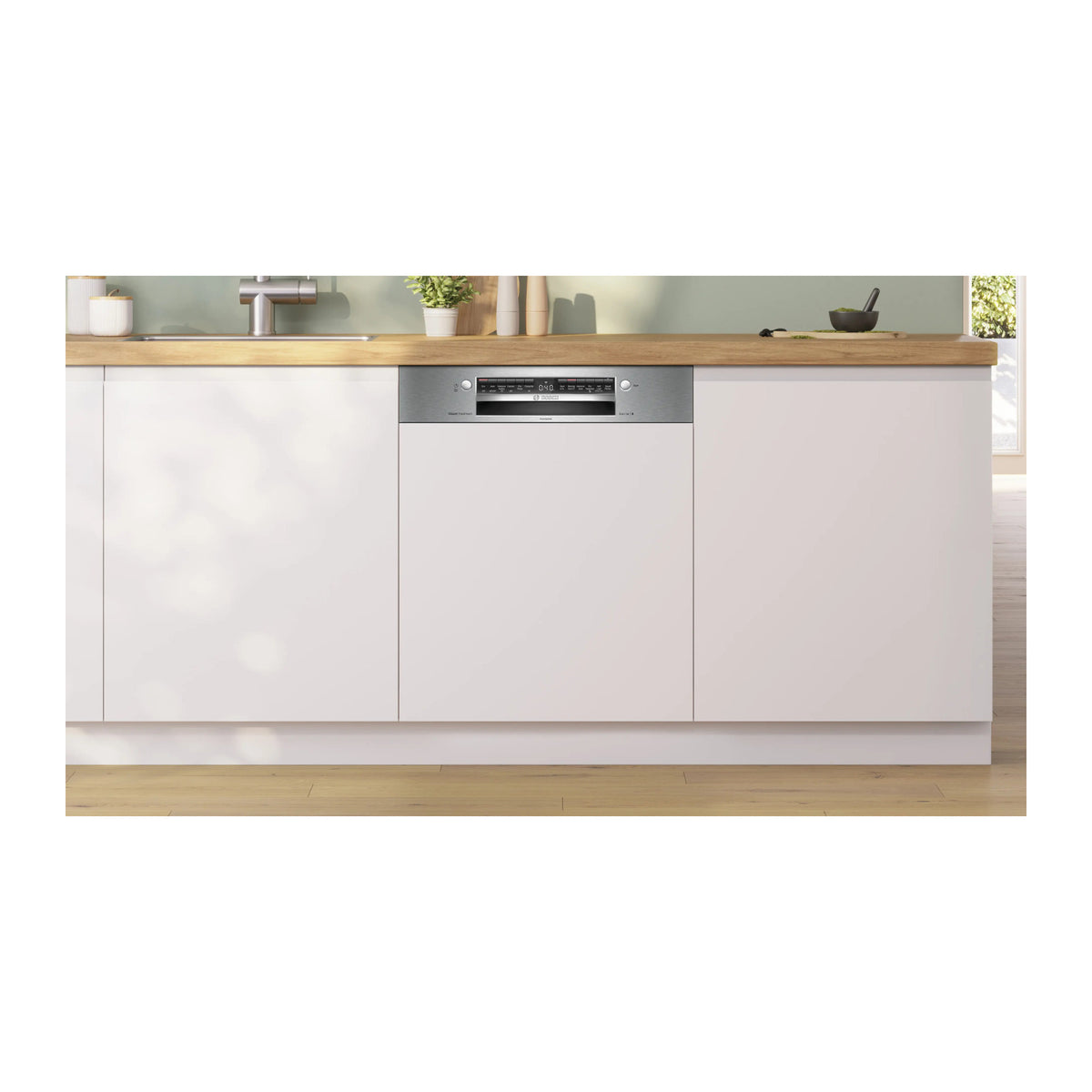 Bosch SMI4IKS00I dishwasher installed in a white fitted kitchen below a wooden worktop