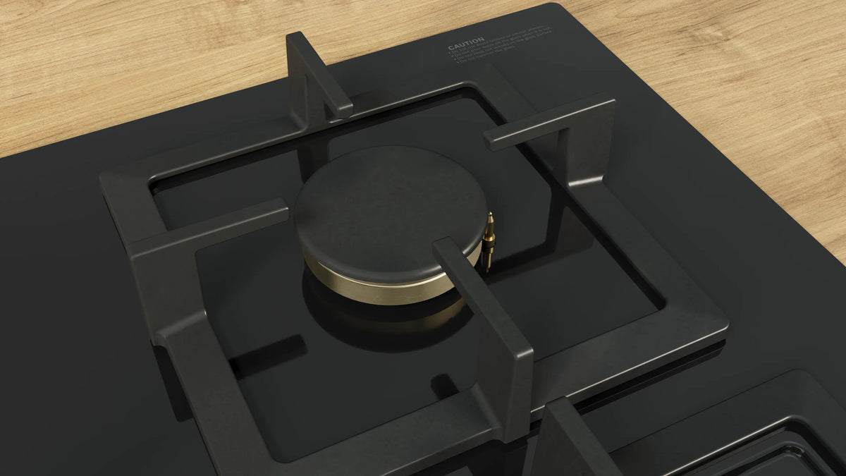 Close-up of a burner with cast-iron pan support on the Bosch PNV9B6G21I glass gas hob
