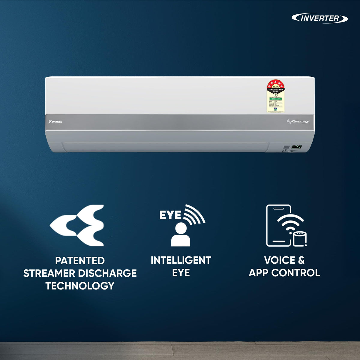 Daikin JTKJ60XV16 split AC mounted on a blue wall with icons for streamer discharge, Intelligent Eye and voice and app control