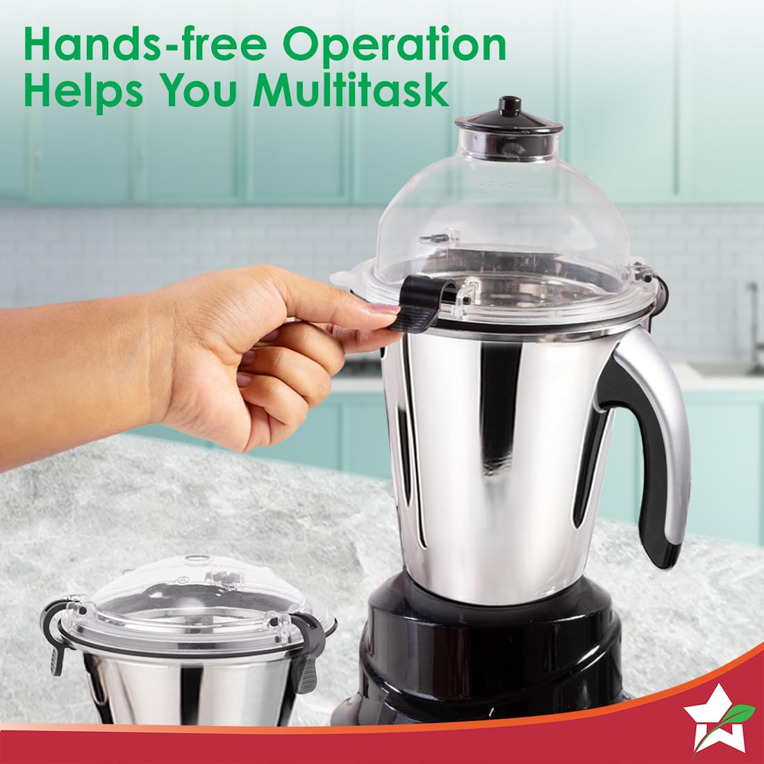 Hand fastening the lid lock on the large jar of the Wonderchef Galaxy 63154818 mixer grinder