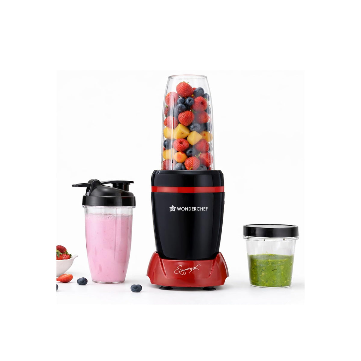 Wonderchef Nutri-Blend Turbo 63155247 mixer grinder in black and red with a tall jar of fruit, a sipper jar of pink smoothie and a short jar of green chutney