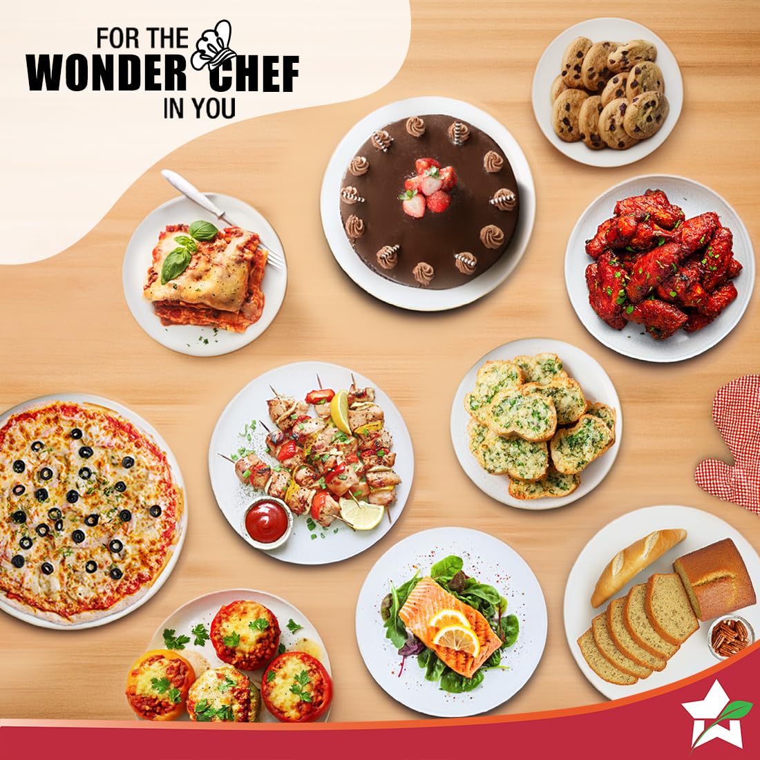 Spread of dishes including pizza, cake, lasagna, kebabs, salmon, garlic bread and cookies for the Wonderchef 63152220 OTG