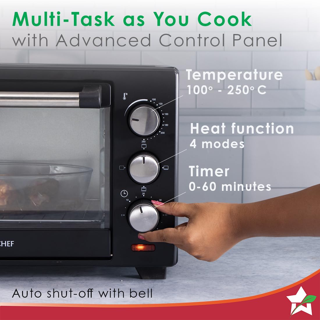 Hand turning the timer knob on the Wonderchef 63152143 OTG control panel showing temperature, heat function and timer