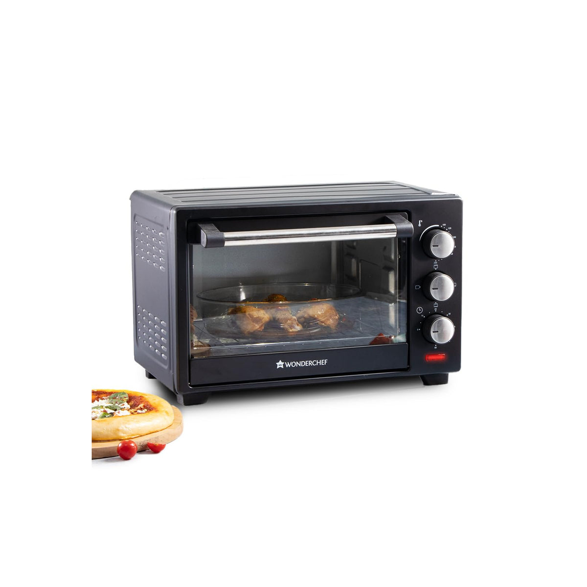 Wonderchef 63152143 19 L black OTG with chicken in a glass dish and a pizza beside it