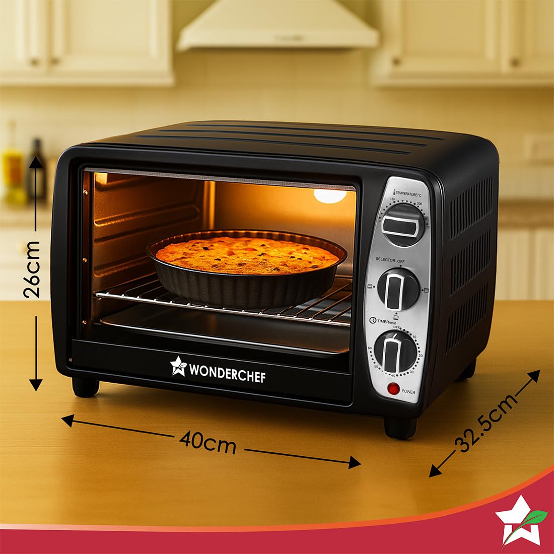 Wonderchef 63155025 OTG on a kitchen counter with a baked tart inside, showing 40 cm width, 32.5 cm depth and 26 cm height
