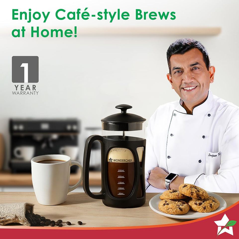 Wonderchef 63152774 French press with coffee beside a mug and cookies, with a 1 year warranty badge