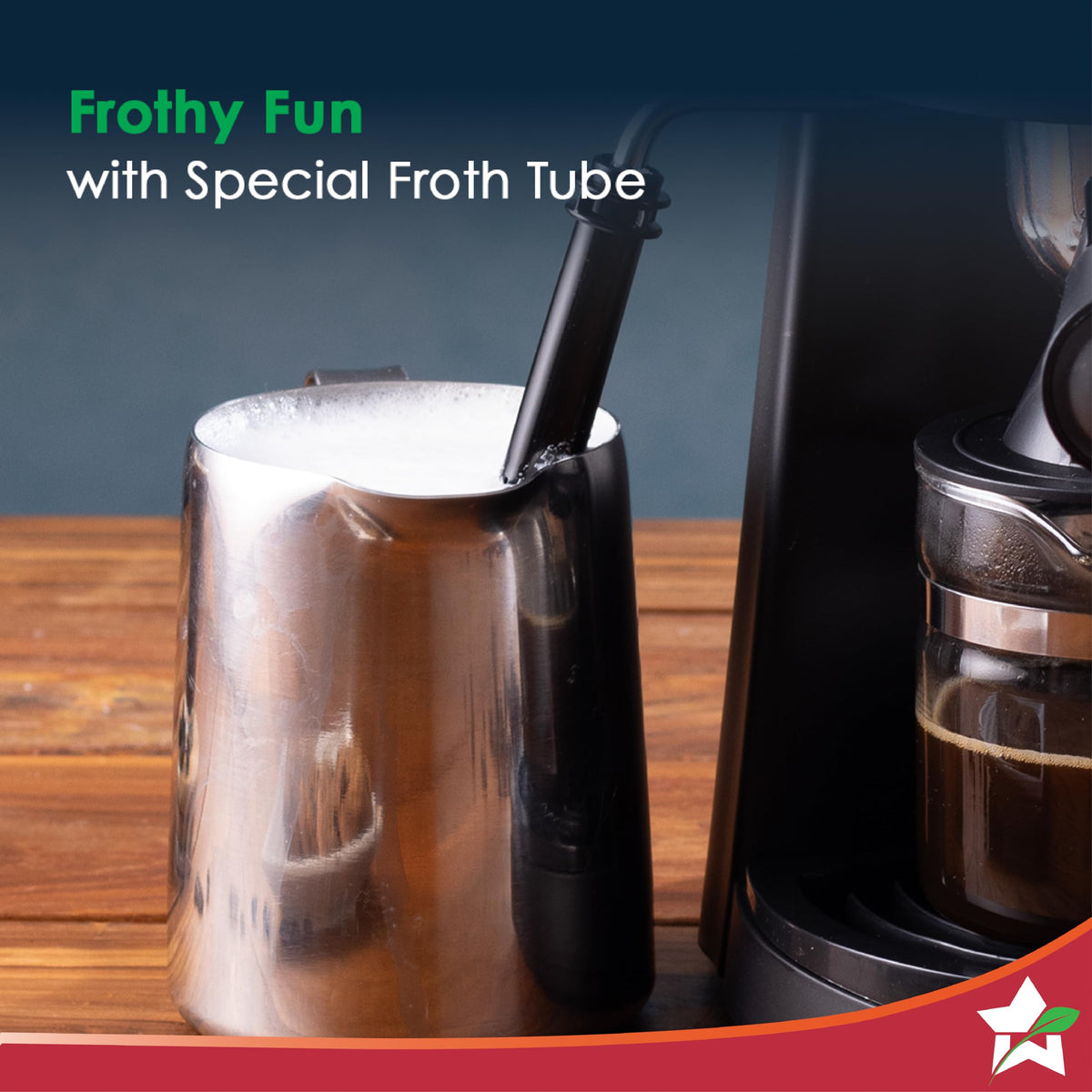 Wonderchef Regenta 63154851 steam froth tube frothing milk in a steel jug beside the glass carafe