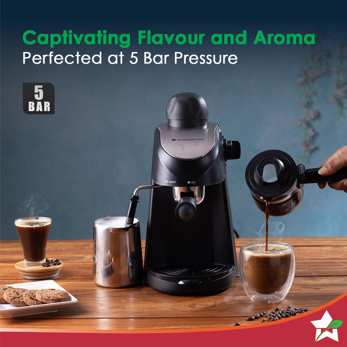 Wonderchef Regenta 63154851 espresso machine with 5 bar badge, steel milk jug and coffee being poured from the carafe
