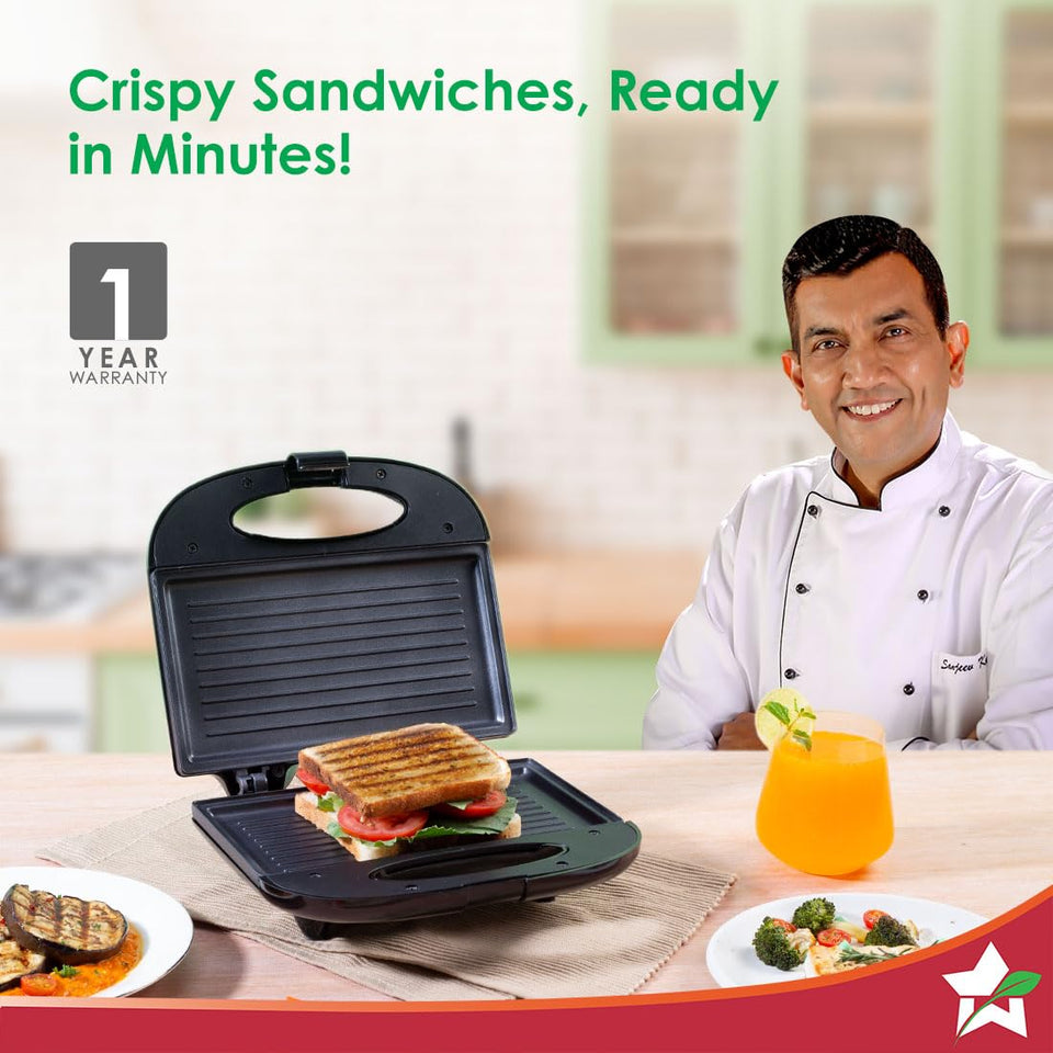 Wonderchef Prato Plus 63154445 griller with a grilled sandwich, with a chef beside it and a 1 year warranty badge