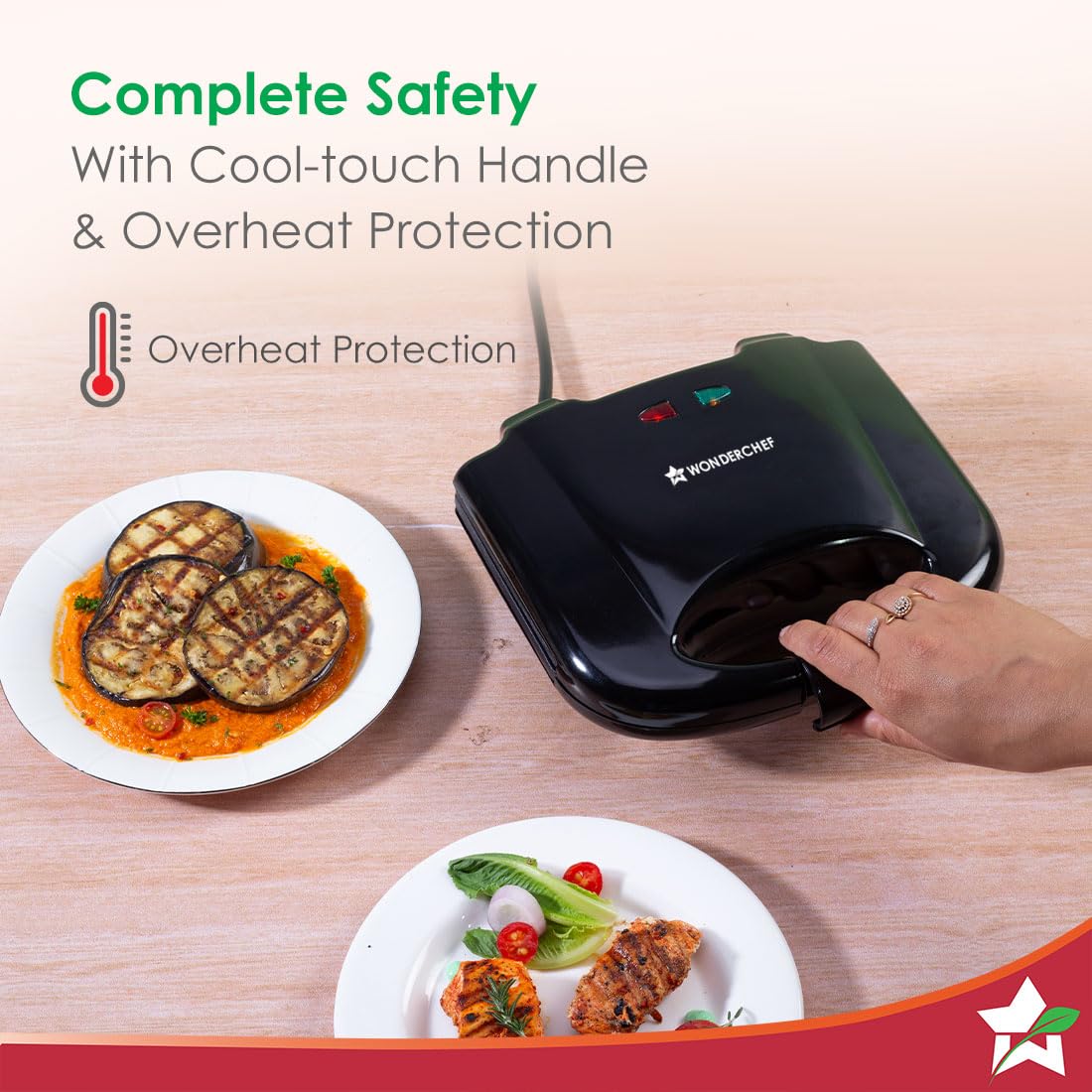 Wonderchef Prato Plus 63154445 griller closed with a hand on the cool-touch handle, highlighting overheat protection