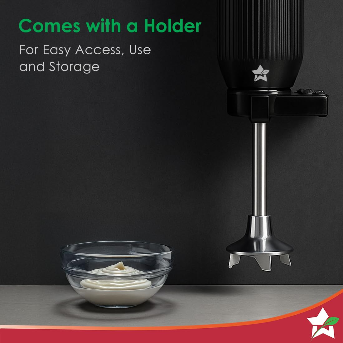 Wonderchef Prima Plus hand blender resting in its wall hanging holder above a bowl of cream