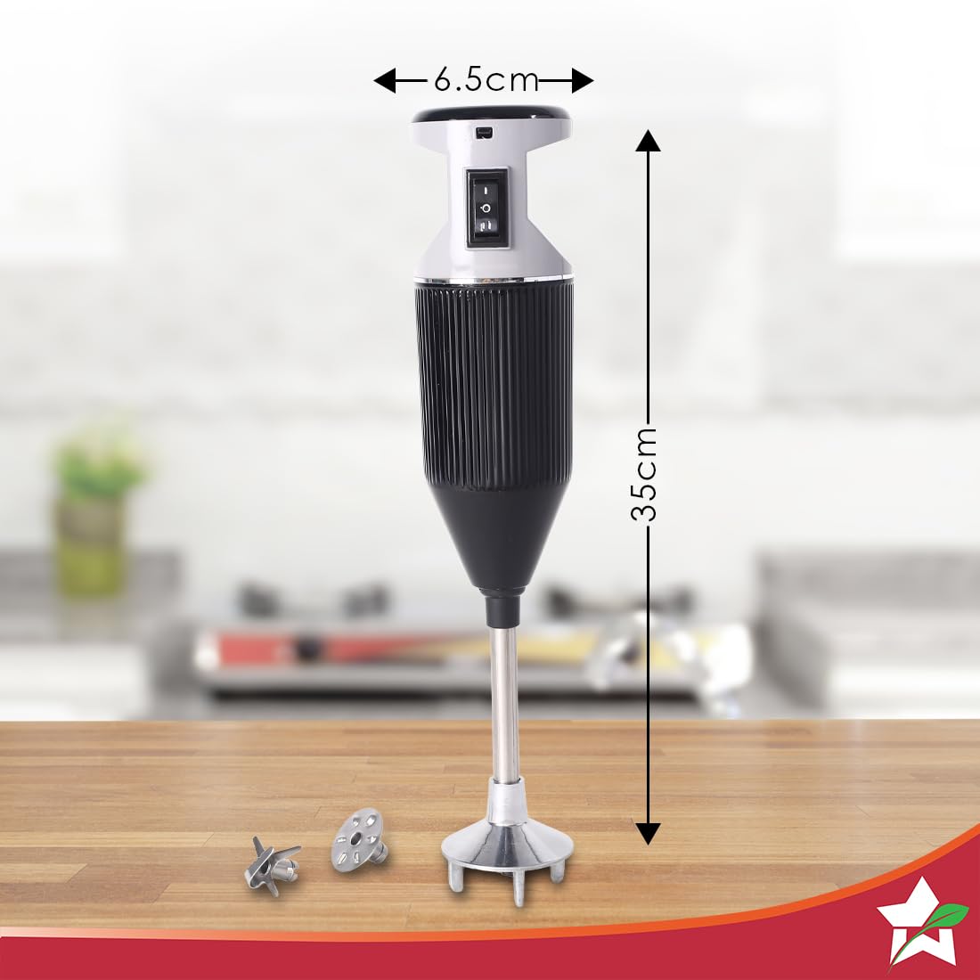 Wonderchef Prima Plus black hand blender on a wooden counter with dimension markings and loose blades