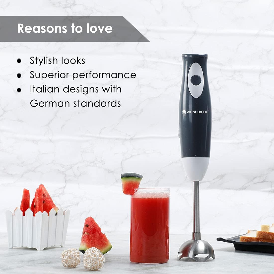 Wonderchef Ultima Plus hand blender beside a glass of watermelon juice with a Reasons to love panel