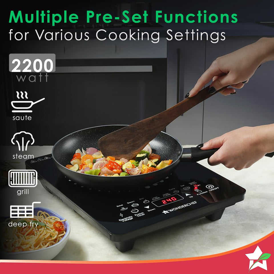 Wonderchef 63152875 induction cooktop with a pan of sautéed vegetables, with 2200 watt and preset function icons