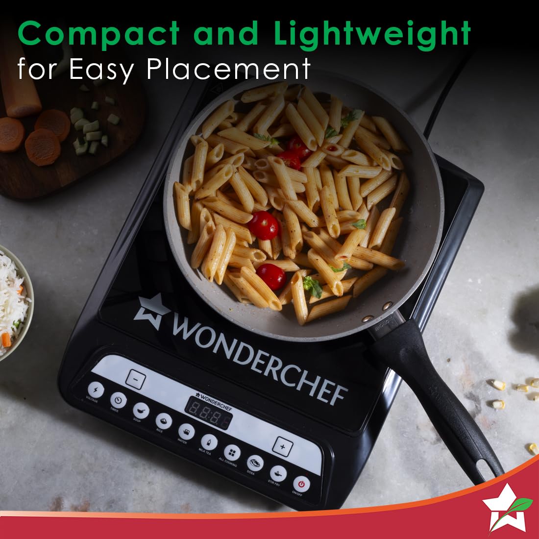 Top view of the Wonderchef Power 63154814 induction cooktop with a pan of pasta and the control panel visible