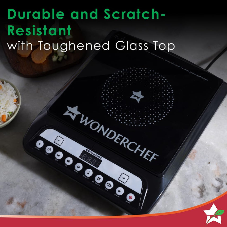 Wonderchef Power 63154814 induction cooktop with toughened glass top beside a bowl of rice and chopped vegetables