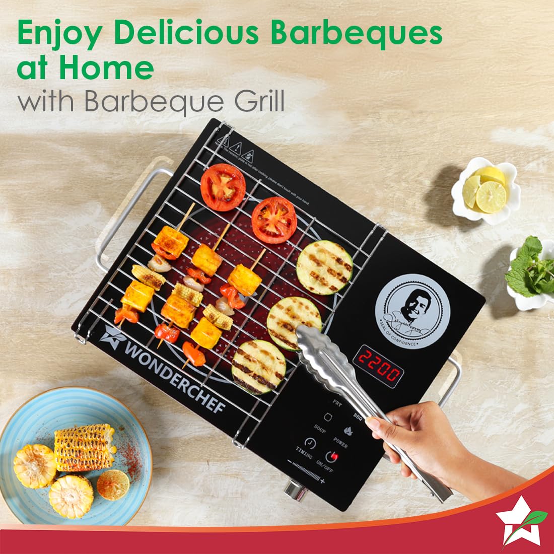 Top view of Wonderchef 63154925 cooktop with barbeque grill, skewers and vegetables being turned with tongs