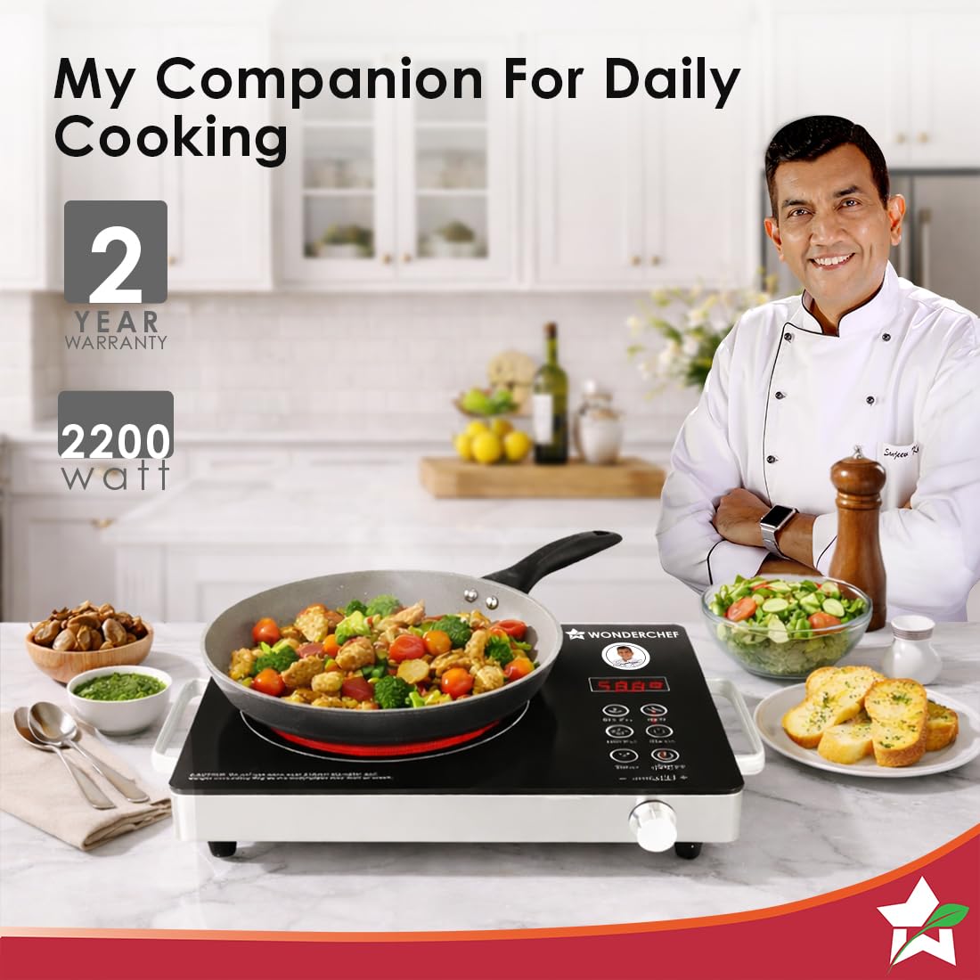 Wonderchef Evita infrared cooktop with a pan of vegetables, showing 2-year warranty and 2200 watt badges