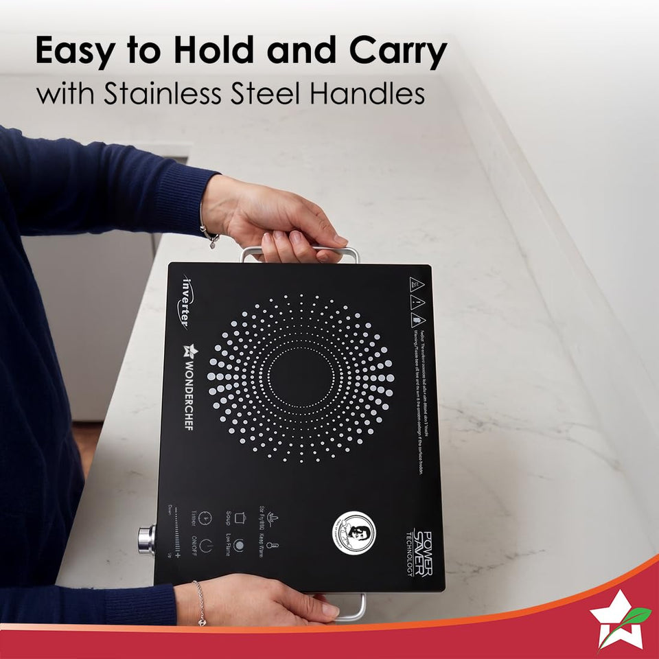 Person carrying the Wonderchef Smart Cook infrared cooktop by its stainless steel side handles
