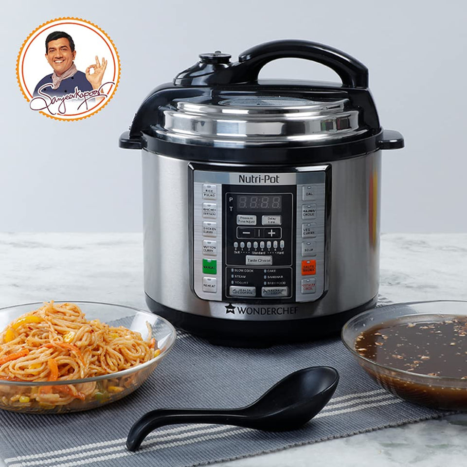 Wonderchef Nutri-Pot 63153102 electric pressure cooker on a counter with noodles, a bowl of sauce and a black ladle