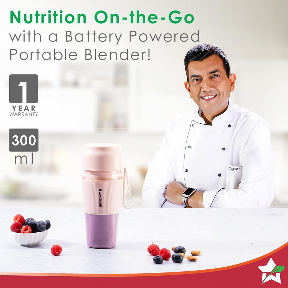 Wonderchef Nutri Cup 63154460 pink portable blender with a 300 ml and 1 year warranty callout beside a chef, with berries on a counter