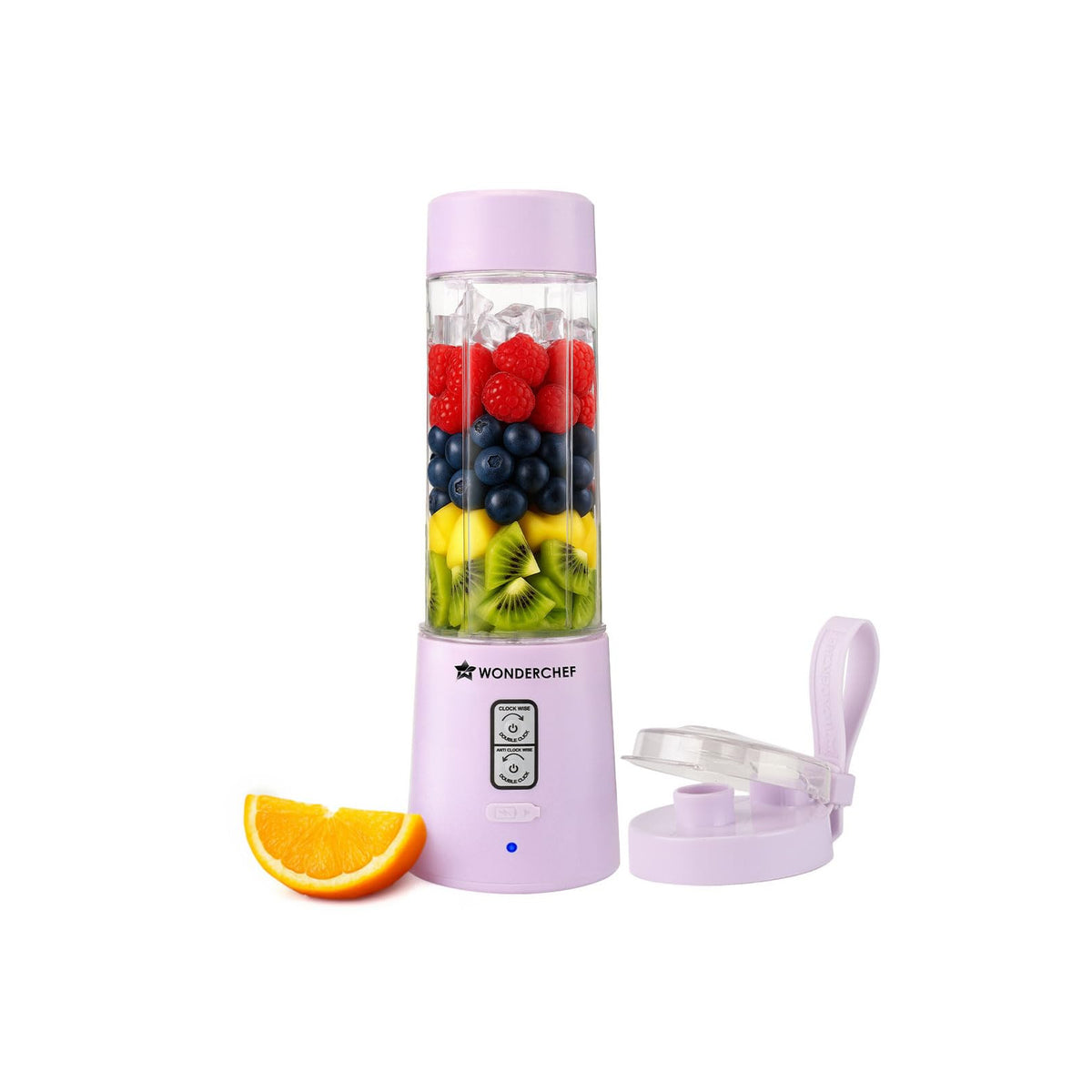 Wonderchef Twister 63155201 lavender portable blender filled with layered berries, kiwi and ice, with its lid and an orange wedge beside it