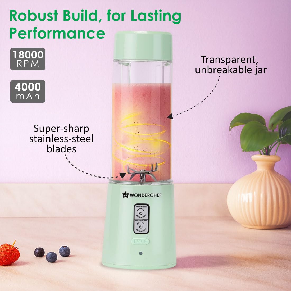 Wonderchef Twister 63155202 blender with a smoothie, labelling the transparent jar and stainless-steel blades, with 18000 RPM and 4000 mAh callouts