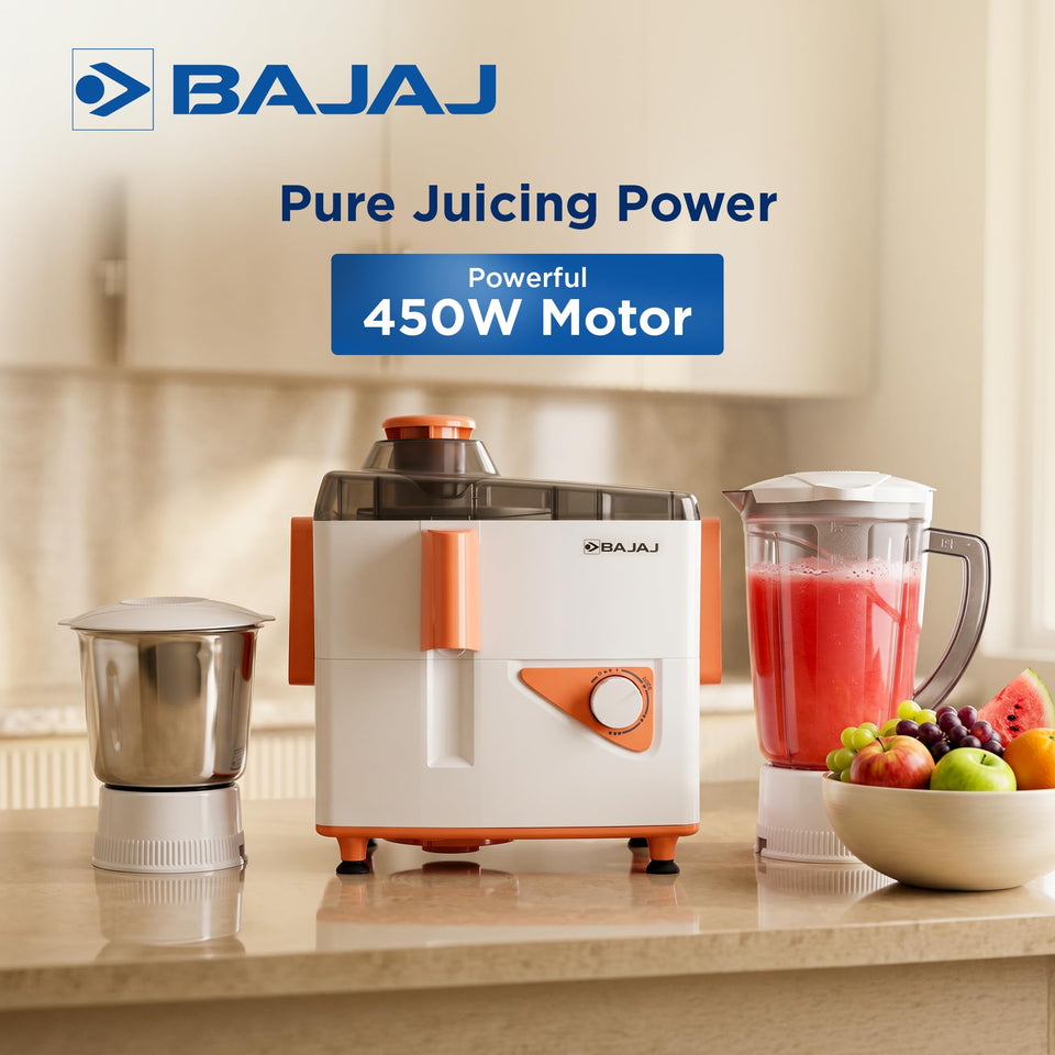 Bajaj Neo JX4 450 W juicer mixer grinder with its steel grinding jar and blender jar beside fruit