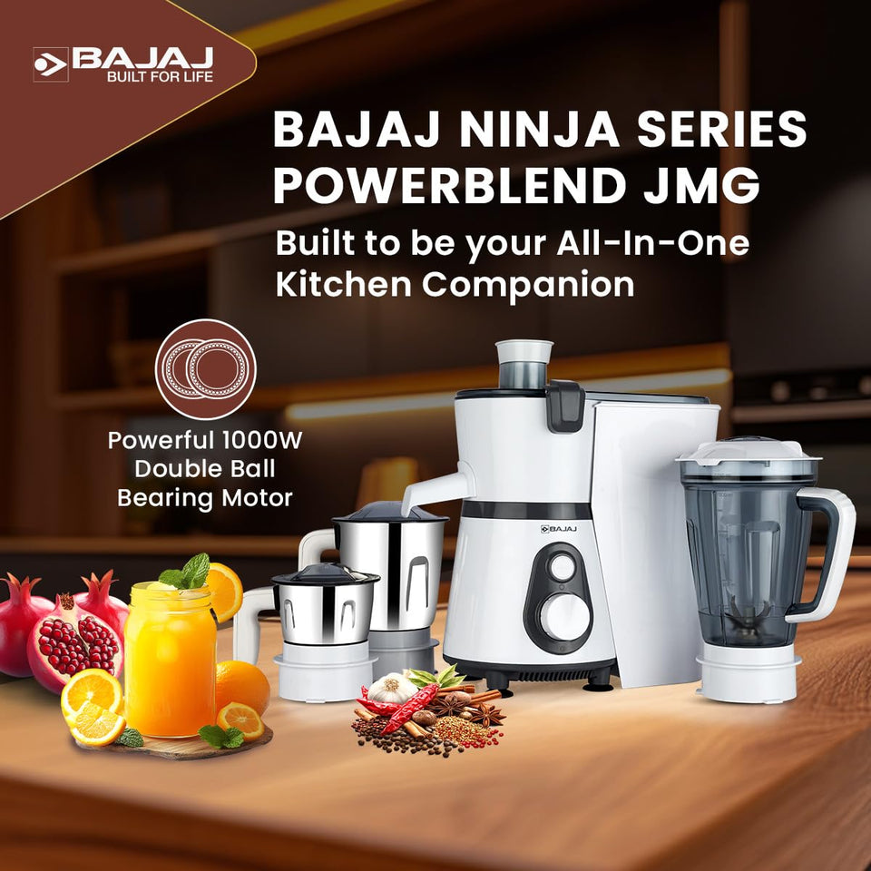 Bajaj 410703 Ninja Series PowerBlend JMG on a kitchen counter with jars, fruit and spices, highlighting the 1000W double ball bearing motor