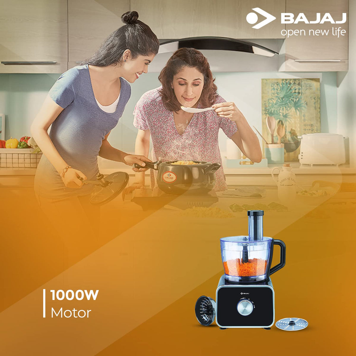 Bajaj FX-1000 Dlx food processor with shredded carrot in the bowl and a 1000W motor callout beside two women cooking
