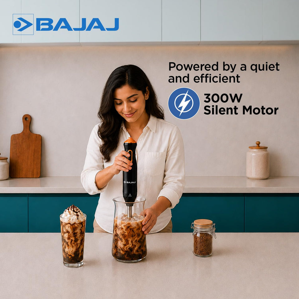 Woman using the Bajaj HB 21 hand blender to blend an iced coffee drink, with a 300W silent motor callout